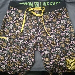 DIXXON Skull Floral Shorts - Black and Yellow